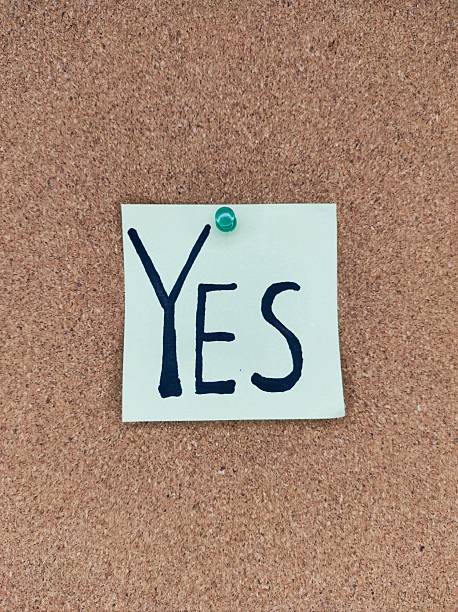 istock Handwritten YES note on cork board  self-confidence and encouragement message 2245487797