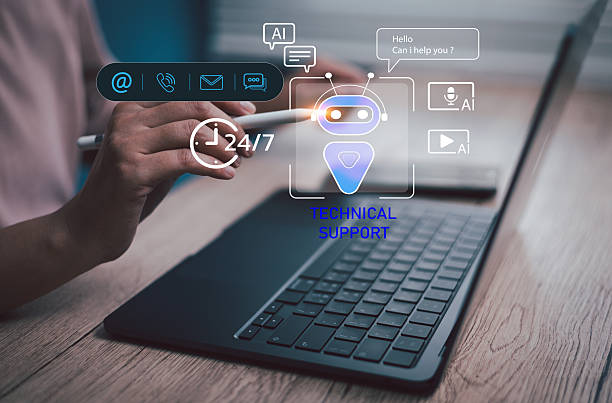 istock Hand using digital pen stylus pointing laptop with virtual AI chatbot icons, representing 24/7 customer service, automation, and smart virtual assistant technology technical support 2245502694