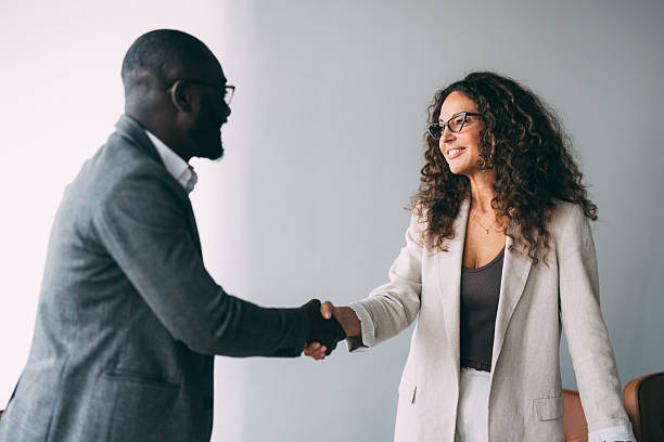 istock Business partners shaking hands after reaching agreement 2245504745