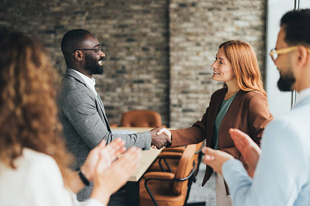 istock Business partners shaking hands after reaching agreement 2245504761
