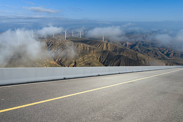 The loess plateau landscape behind the empty highway, car advertisement image