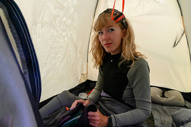 istock Exploring the wilderness in a cozy tent while enjoying nature's tranquility 2245517734