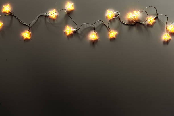 Fairy lights create a warm ambiance in a cozy indoor space during the evening hours