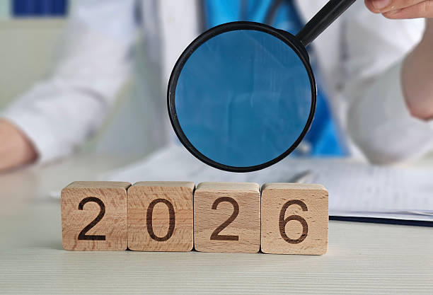 istock Focus on the future with 2026 blocks and magnifying glass 2245523144