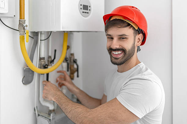 istock Plumber Installing Radiant Heating System Indoors Looking At Camera 2245531574