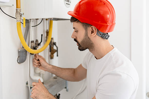 istock Professional Technician Checking Heating Pipes in Apartment 2245531585