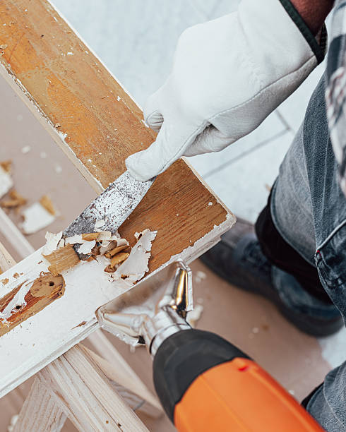 istock Carpenter at work, restoring an old wooden window. Carpentry. 2245531723