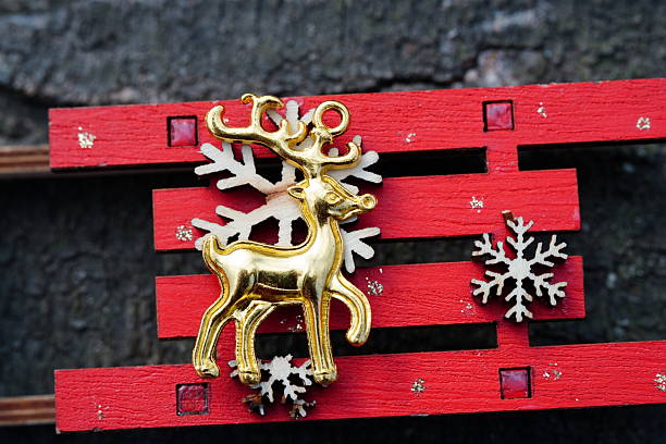 Christmas decorations. Metal deer figurine in close-up.