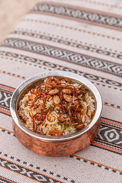 istock Arabic Chicken biriyani rice dish served with cashew nuts and onions 2245544099