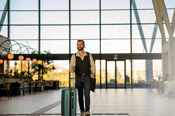 istock A handsome man on his way to his flight! 2245550234