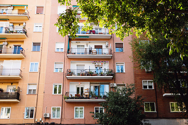 Facades of residential buildings with balconies in Madrid, Spain