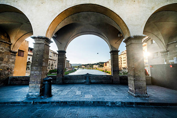 The Ponte Vecchio  is a medieval stone closed-spandrel segmental arch bridge over the Arno, in Florence