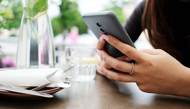 istock Girl Surfing On Internet On A Smartphone While Waiting In Cafe 2245552781