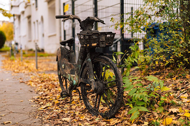 bicycle on the street with a sign indicating the direction of a cafe