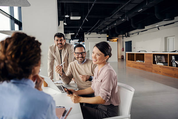 istock Business people collaborating at office meeting 2245556489