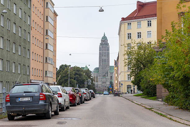 A street view in Kallio district, Helsinki showing the local stone church at the end of the street.