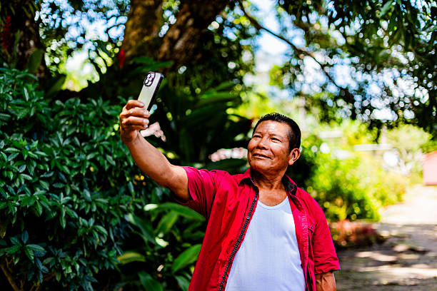 istock Indigenous farmer taking a selfie in rural village 2245563161