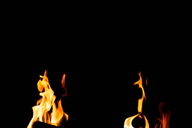 Texture of natural fire at night, on a black background.