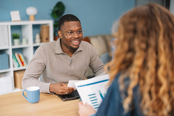 istock Man smiling confidently during a business meeting 2245566387