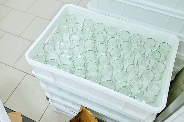 istock Transparent glass jars arranged neatly in a white plastic container, showcasing organized storage in a clean, modern kitchen environment 2245566553