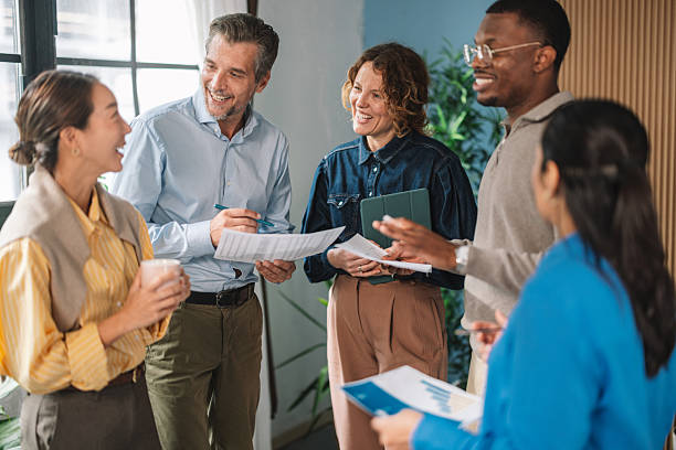 istock Celebrating Success in a Positive Team Environment 2245566830