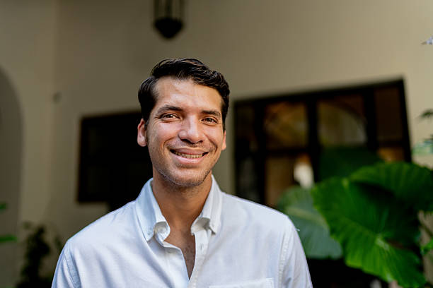 istock Portrait of young man at home 2245567486