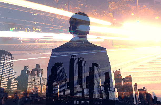 istock Businessman Looking Toward City Skyline with Multiple Exposure Concept 2245567575