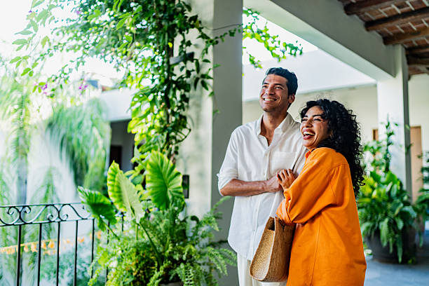 istock Happy young couple walking through hotel 2245567941