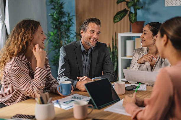 istock Teams Sharing Insights During Workplace Meeting 2245568189