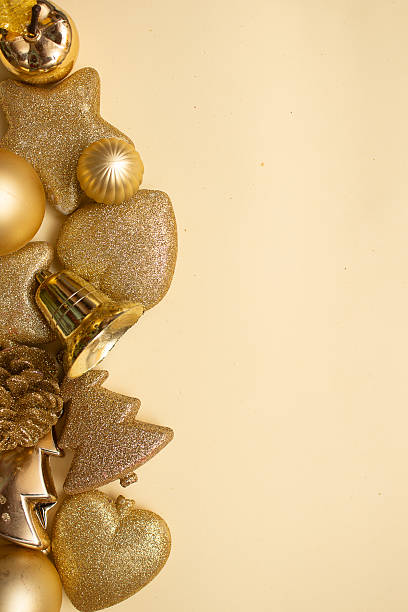 istock Golden Christmas ornaments on a colorful background 2245568582