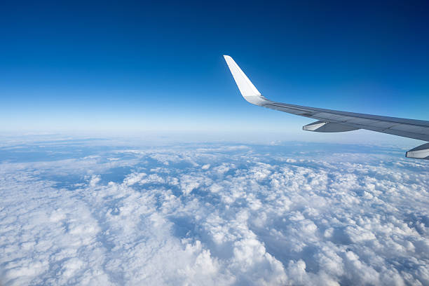 istock View from the airplane window, clouds from high above 2245569500
