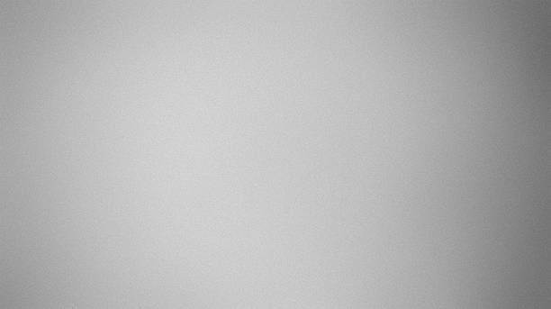istock Noisy gradeint silver gray grainy blurred abstract monochrome plain background 2245569809