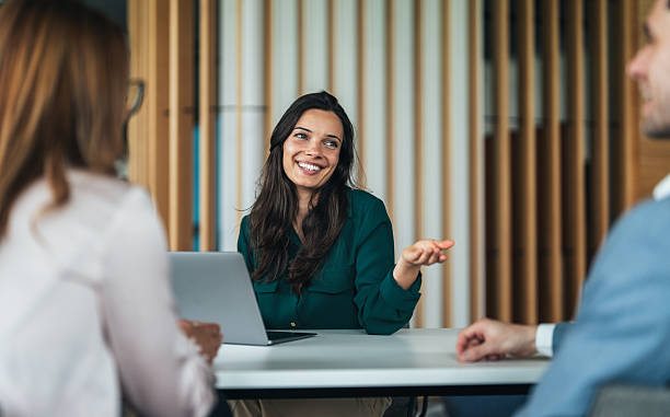 istock Female advisor meeting with clients 2245571926