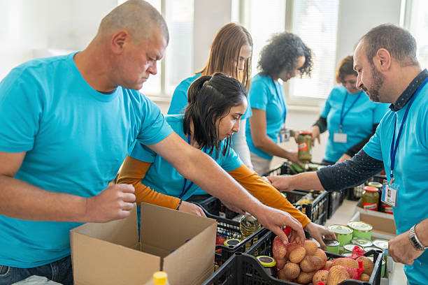 istock Volunteers preparing food donations for people in need 2245574002