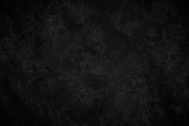 istock Close up retro plain dark black cement concrete wall background texture. Color old concrete wall design element blank. 2245574022