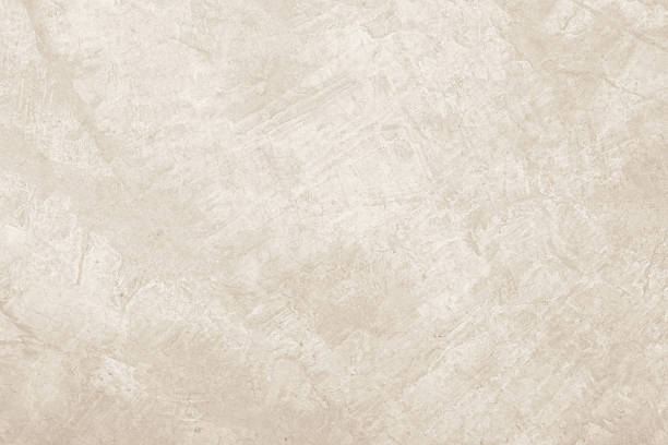 istock Concrete wall texture background. Close up retro plain cream color cement wall background texture. 2245574026