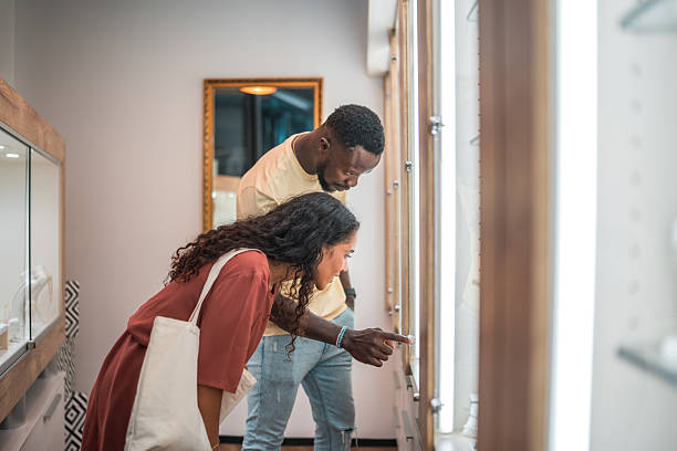 istock Couple Window Browsing at the Jewelry Store 2245578389