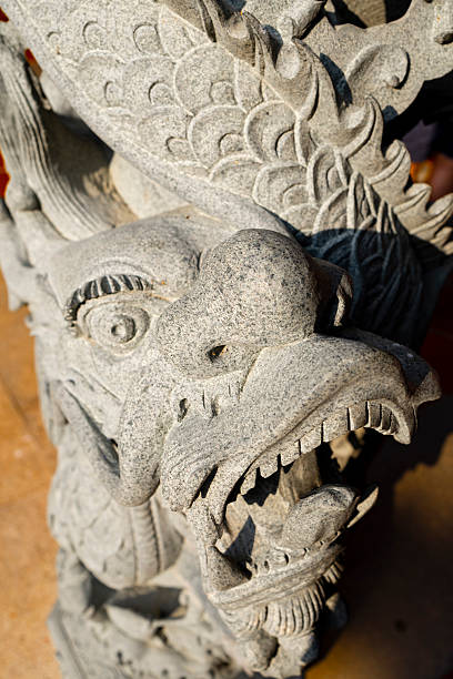 istock Architectural Detail: Intricate Carvings and Cloud Patterns on the Dragon Pillar 2245580262