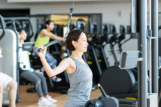 istock Middle-aged woman training at the gym 2245580415