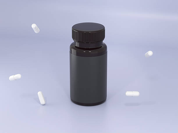 istock Supplement Vitamin pill black bottle with capsules 3D render 2245584307
