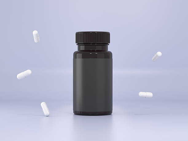 istock Supplement Vitamin pill black bottle with capsules 3D render 2245584309