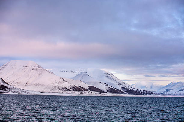 istock Longyerbeyen, Svalbard, Beautiful mountain range with a blue ocean in the background 2245586572