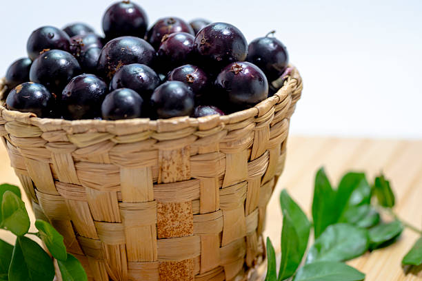 istock Wooden basket full of jabuticabas 2245586719