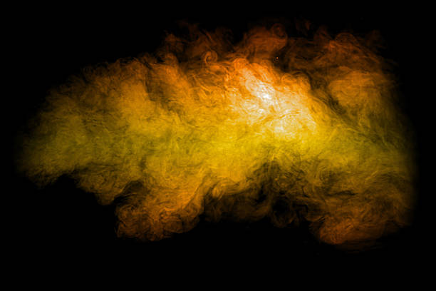 Dust cloud texture background with brown and yellow tones on dark space. Perfect for pollution concept, explosion effect, or abstract motion design for creative and environmental projects.