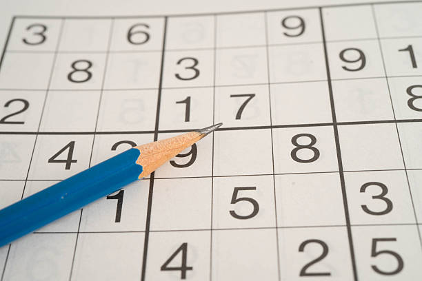 istock Sudoku puzzle, game to play for keep you brain younger for developing Alzheimer disease in senior patient. 2245599632