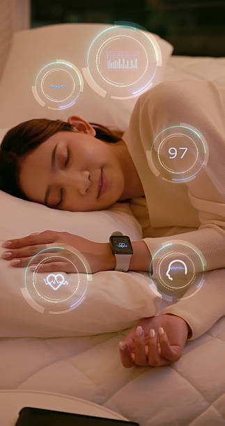 istock Woman sleeping with smartwatch tracking sleep health data 2245608336