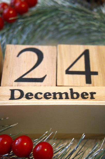 istock December 24 calendar date with Christmas decoration 2245613380