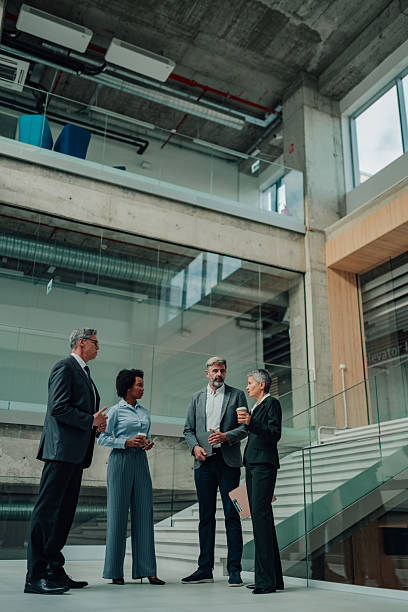 istock Business colleagues discussing during coffee break in office 2245618341