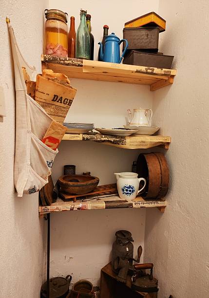 istock Vintage kitchenware collection on corner shelves in the pantry 2245619737