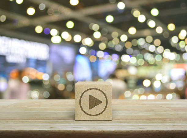Business and design concept - abstract geometric real wooden cube with surreal layout on white floor background and it's not 3D render. It's the symbol of leadership, teamwork and growth